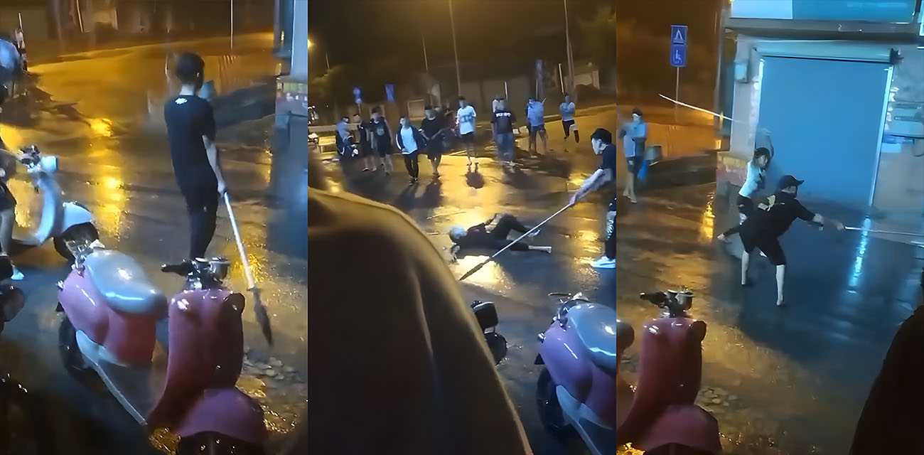 广西桂林两帮精神小伙在街头打群架 两边手拿比人高的长柄刀互砍互劈 喊杀声响彻整个夜晚的街头